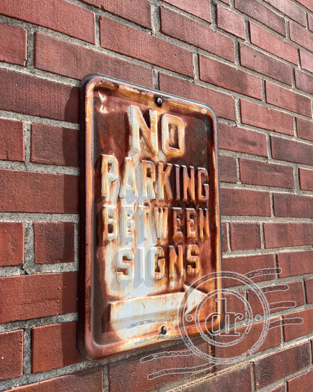 between signs